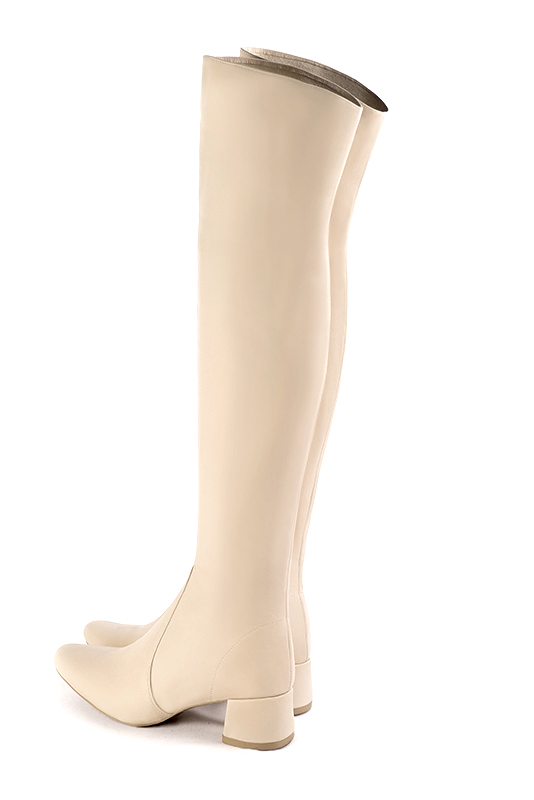 Custom-made women's champagne white stretch elegant thigh-high boots. Round toe. Low flare heels - Rear view